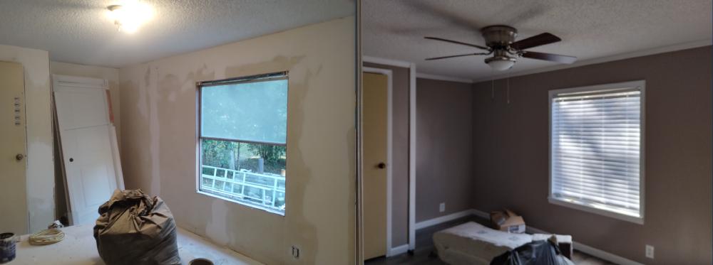 A room with a ceiling fan and a window, part of interior painting services in Cave Spring